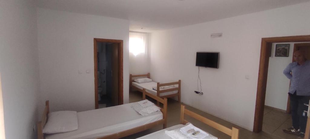 Postel nebo postele na pokoji v ubytování Hotel & Rooms Lombrelle