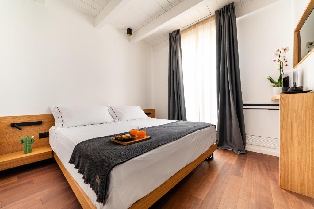 Postel nebo postele na pokoji v ubytování Arringo - Stay comfy