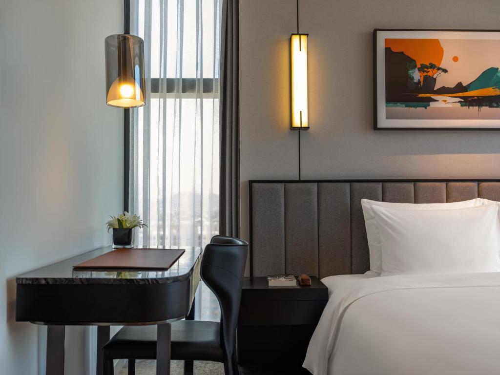 Junior Suite with King and Single Bed - River View and Lounge Access