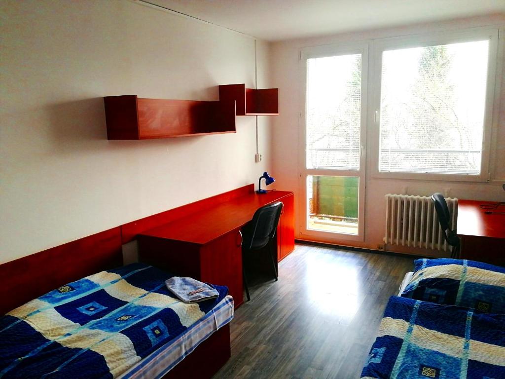 Voodi või voodid majutusasutuse Hostel Blanice toas