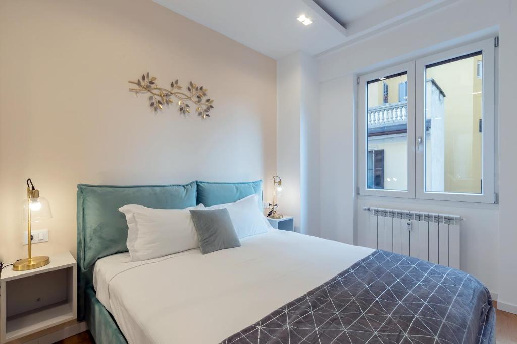 Кровать или кровати в номере Milan Retreats