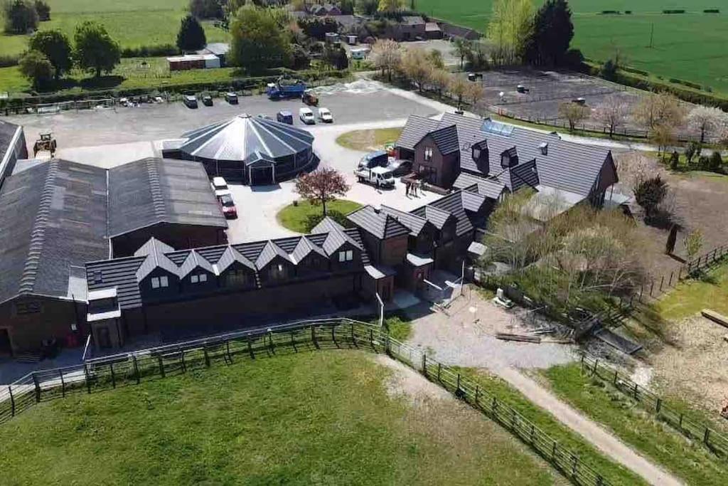 an overhead view of a building with a tent at Appaloosa suite with amazing views of stud farm. in Great Driffield