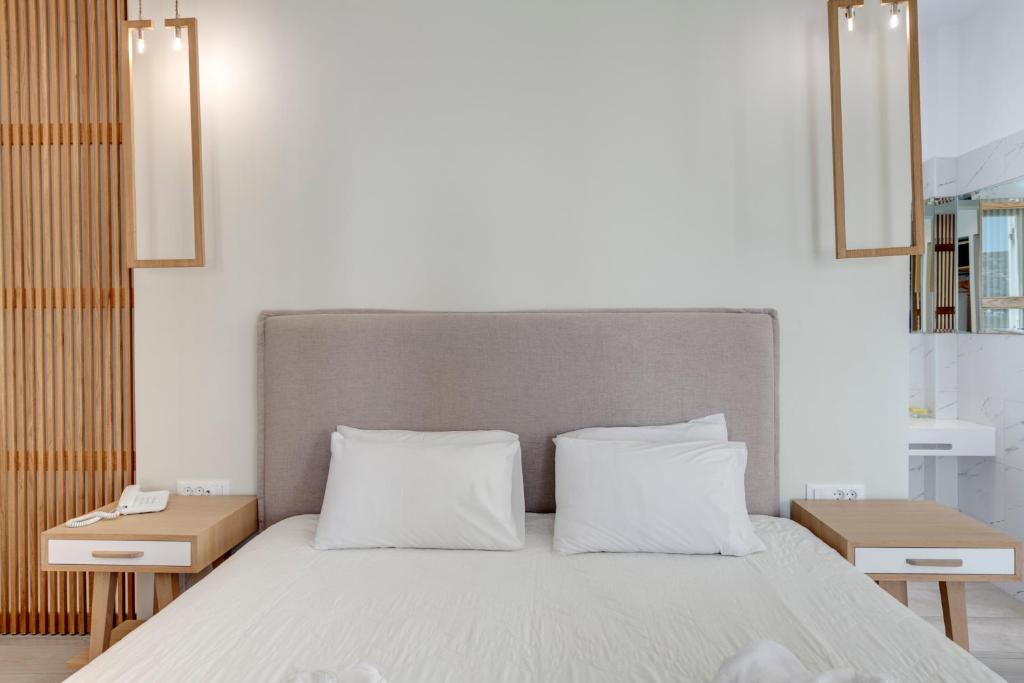 Кровать или кровати в номере Hotel Benois