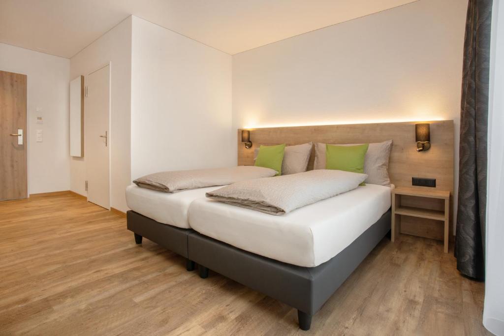 Postel nebo postele na pokoji v ubytování Hotel Tannenboden