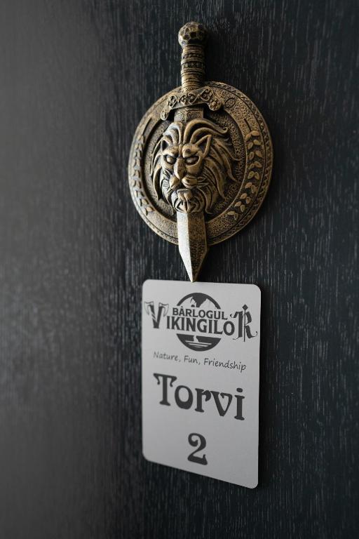 Certifikát, hodnocení, plakát nebo jiný dokument vystavený v ubytování Bârlogul Vikingilor