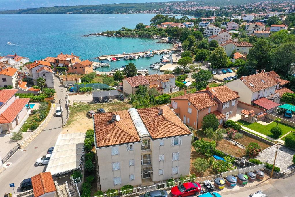 an aerial view of a town next to a body of water at Sea view by Moro 3 in Malinska