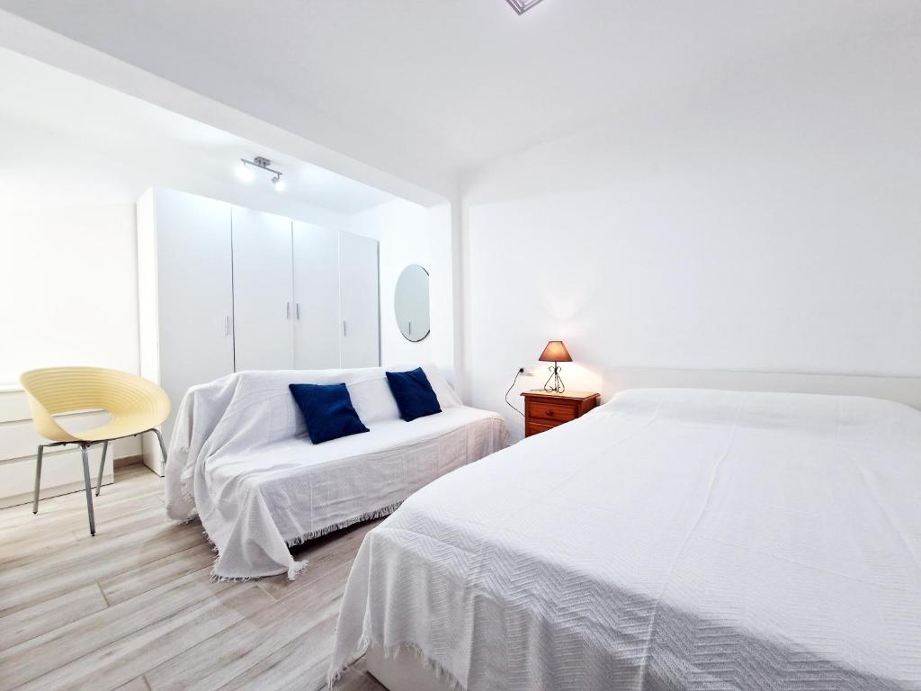 Posteľ alebo postele v izbe v ubytovaní AA Guest - Sol Eco Apartment Lateral Sea Views