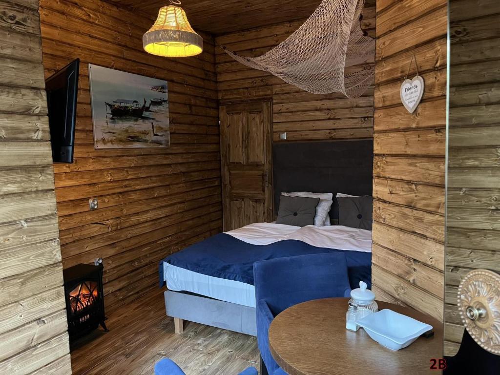 Postel nebo postele na pokoji v ubytování Pensjonat u Babci