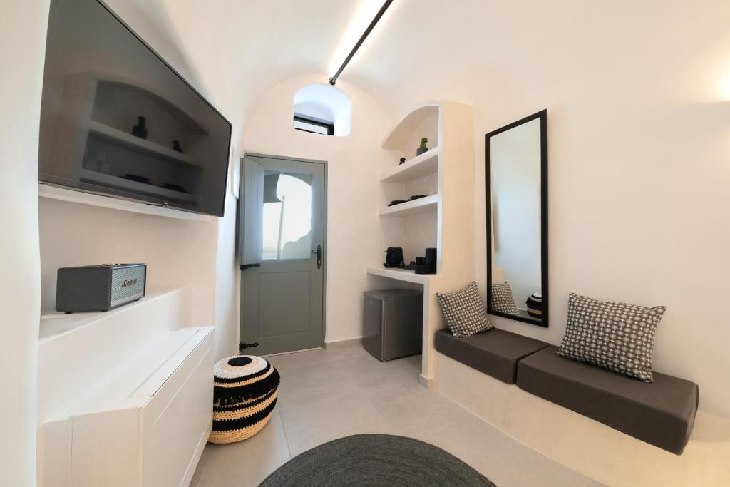 TV a/nebo společenská místnost v ubytování Bligos Villas