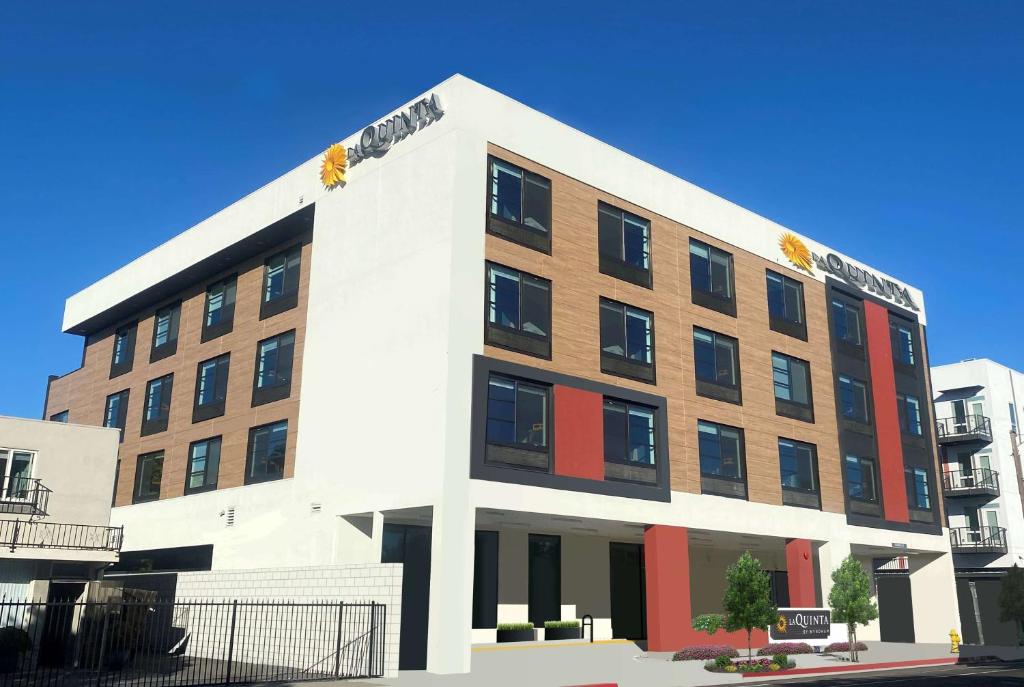 a rendering of the front of a building at La Quinta Inn & Suites by Wyndham San Jose Silicon Valley in San Jose