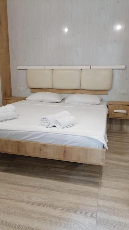Postel nebo postele na pokoji v ubytování Kai Hotel Bar