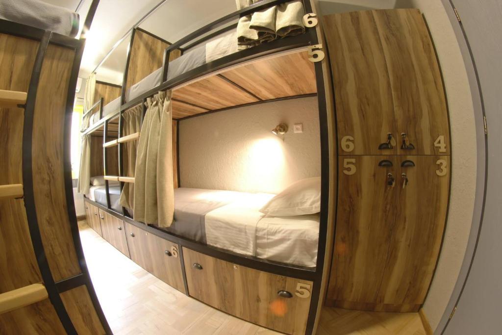 Postel nebo postele na pokoji v ubytování Hostel Nomad