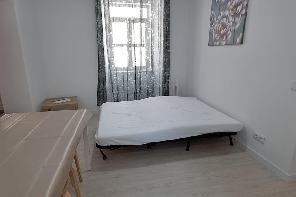 Postel nebo postele na pokoji v ubytování Setubal Holiday Apartment