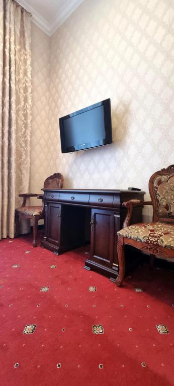 TV a/nebo společenská místnost v ubytování Oreanda Hotel