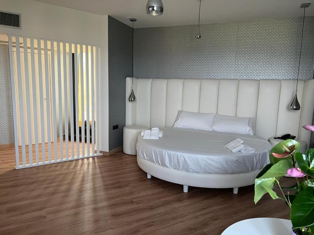 Postel nebo postele na pokoji v ubytování Park Hotel Mirabeau