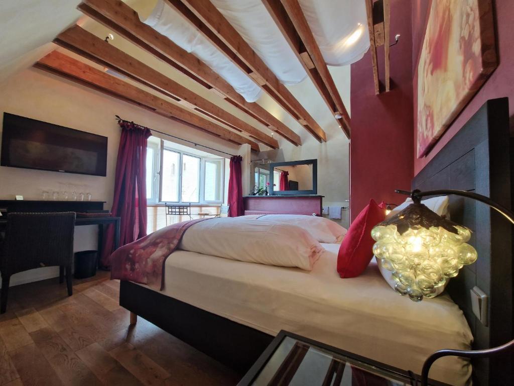 Postel nebo postele na pokoji v ubytování Laurentius Boutique-Hotel & Restaurant