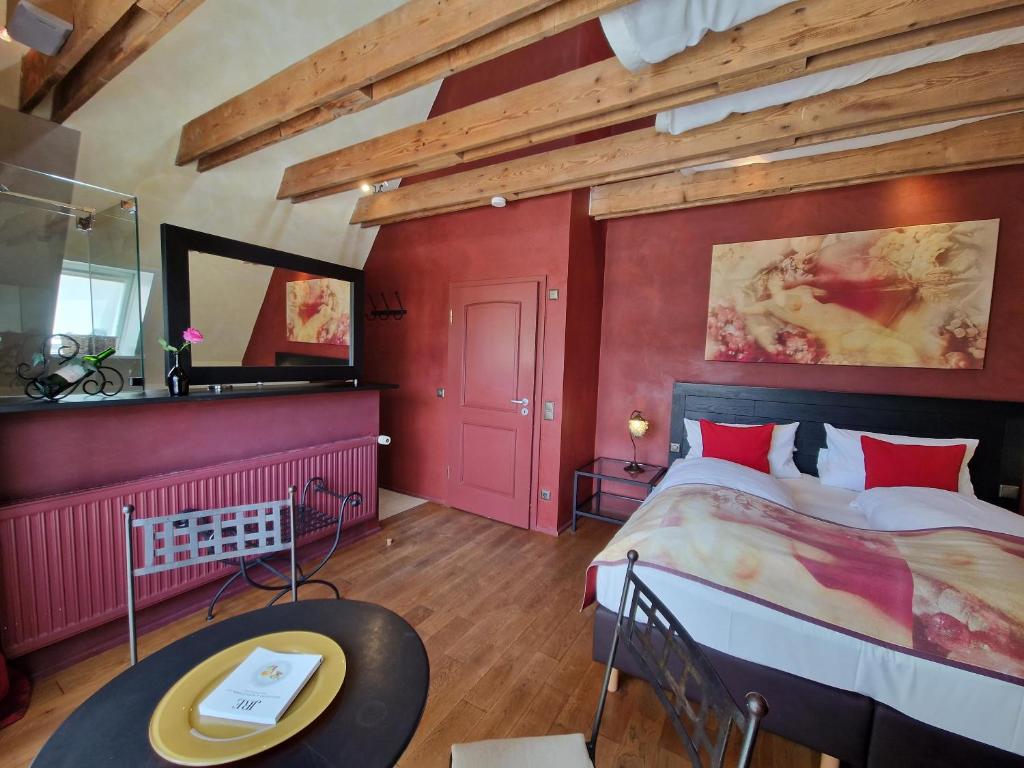 Postel nebo postele na pokoji v ubytování Laurentius Boutique-Hotel & Restaurant