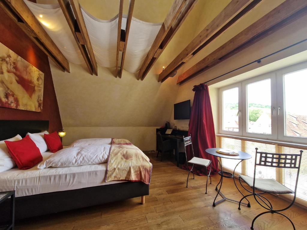 Postel nebo postele na pokoji v ubytování Laurentius Boutique-Hotel & Restaurant