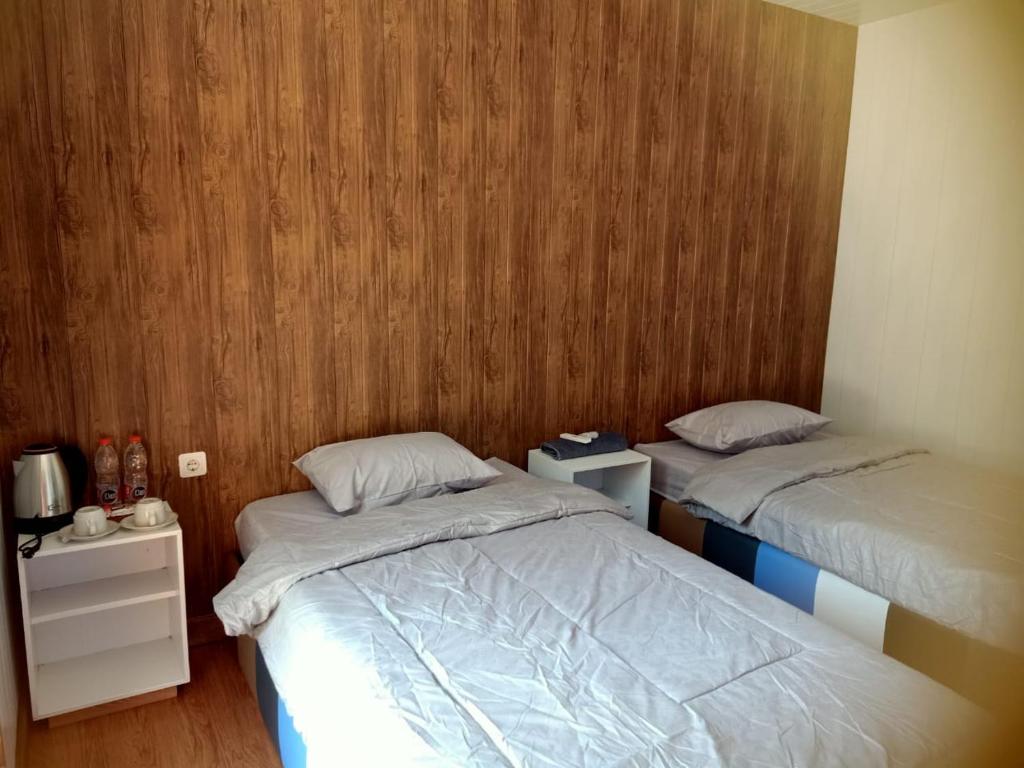 Postel nebo postele na pokoji v ubytování Istana Bromo Resort