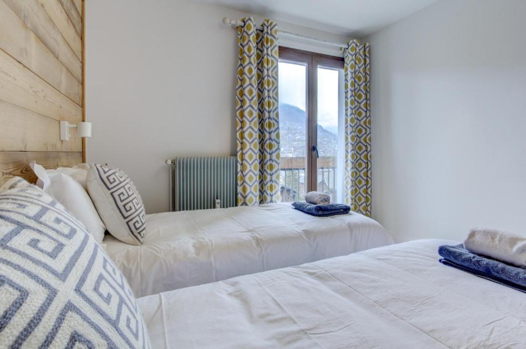 Postel nebo postele na pokoji v ubytování Le Major Apartment