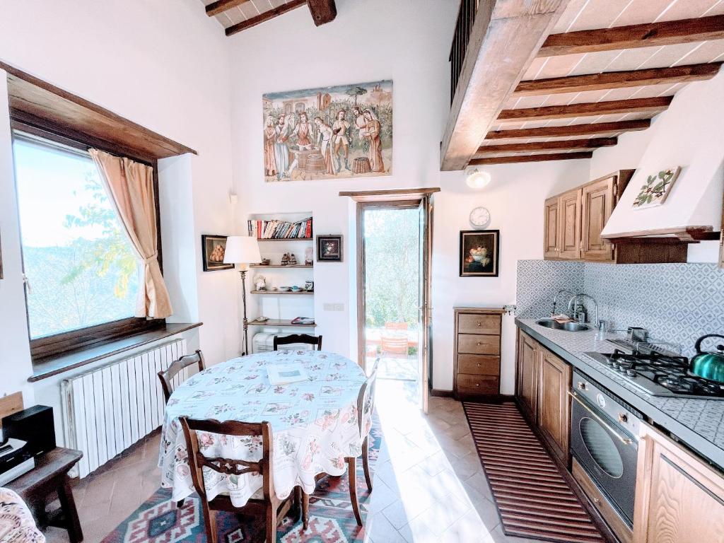 Kuchyň nebo kuchyňský kout v ubytování Spoleto Splash Torettawifiaircondishwasher