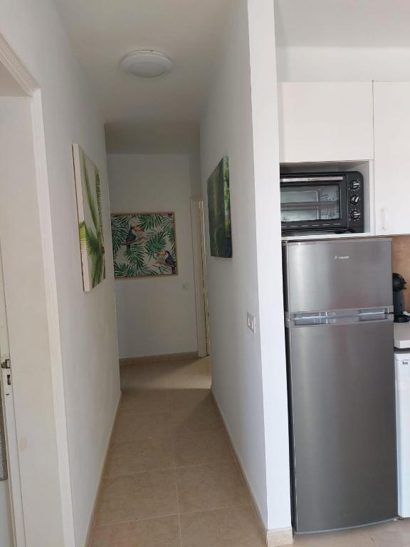 Kuchyň nebo kuchyňský kout v ubytování Apartamento Sol y Playa