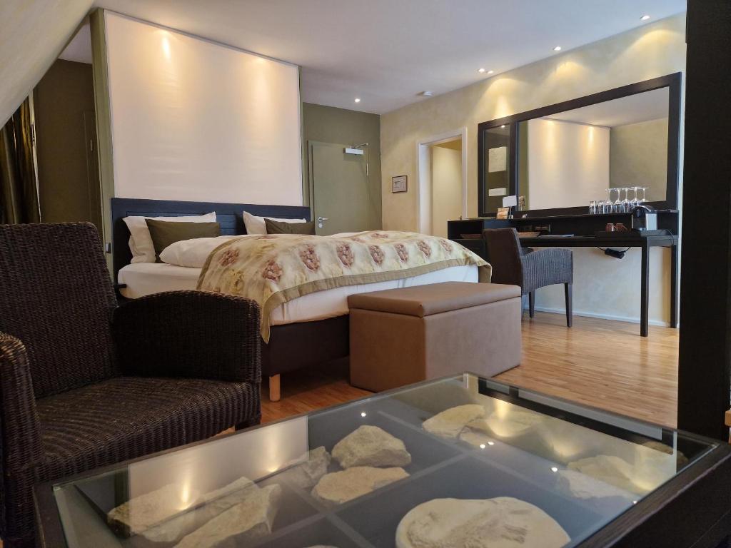 Postel nebo postele na pokoji v ubytování Laurentius Boutique-Hotel & Restaurant
