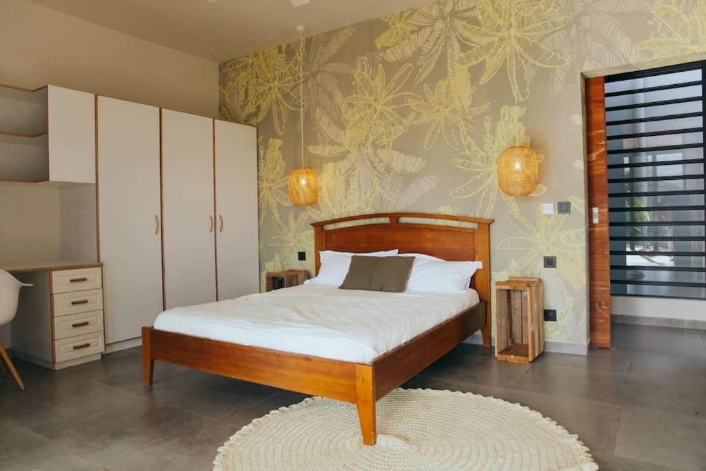 Postel nebo postele na pokoji v ubytování Villa Kamaya, Chamarel