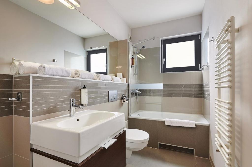 Koupelna v ubytování Golden Tulip Gdańsk Residence