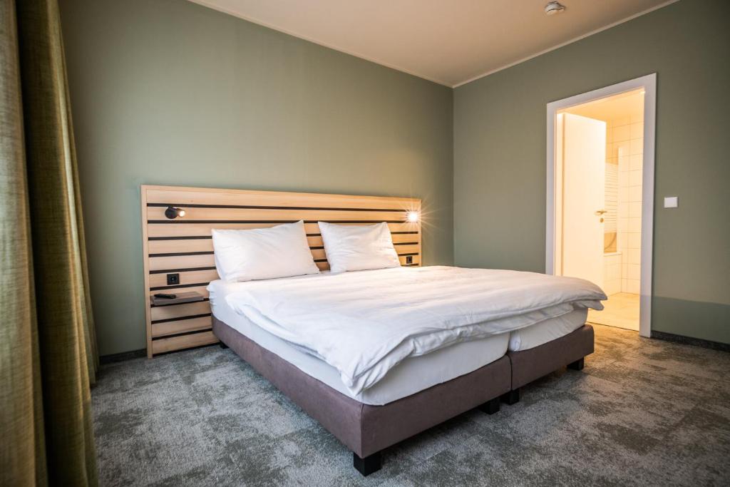 Postel nebo postele na pokoji v ubytování flexymotel Spielberg