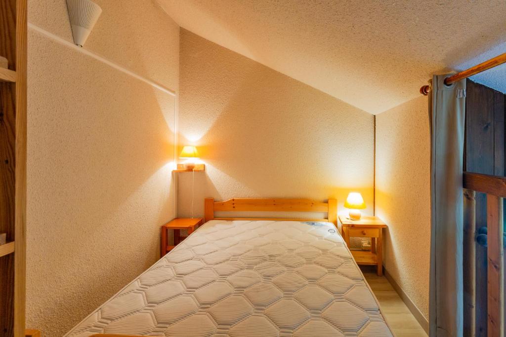 Postel nebo postele na pokoji v ubytování Aravis