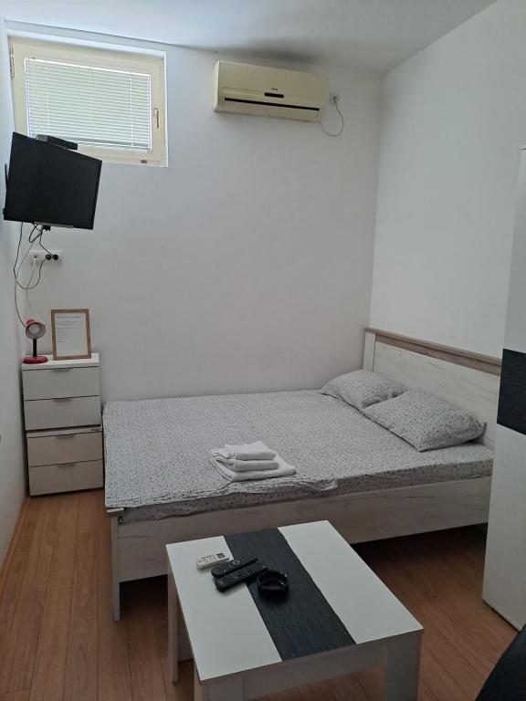 Posteľ alebo postele v izbe v ubytovaní Guest House Zoran