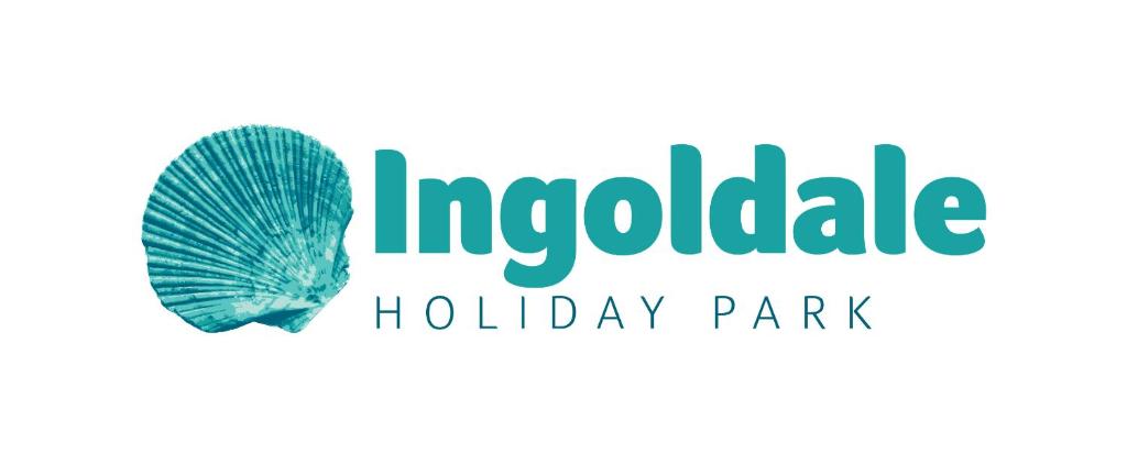 a sign for a holiday park with a blue fish at Brookside Cottages in Ingoldmells