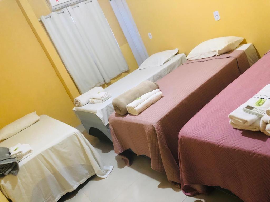 Uma cama ou camas num quarto em Pousada Voadores Jalapão