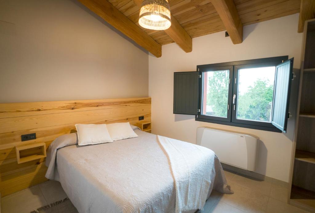 Postel nebo postele na pokoji v ubytování Perafita1750