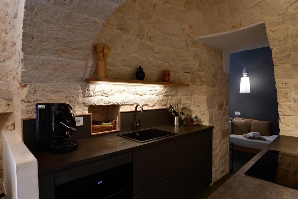 Kuchnia lub aneks kuchenny w obiekcie IL TRULLO BIANCO - Country House & SPA