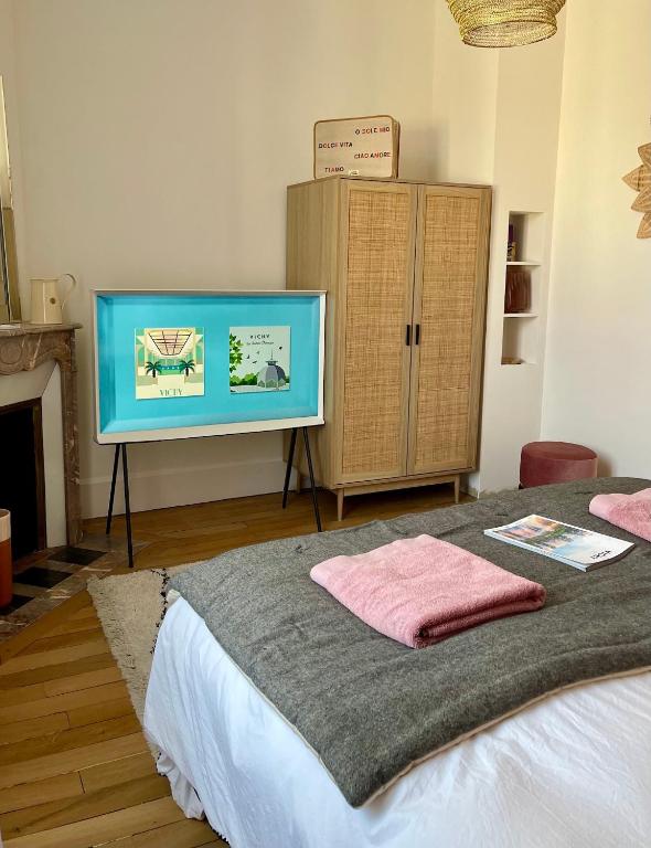 Postel nebo postele na pokoji v ubytování MAISON LE BEAULIEU