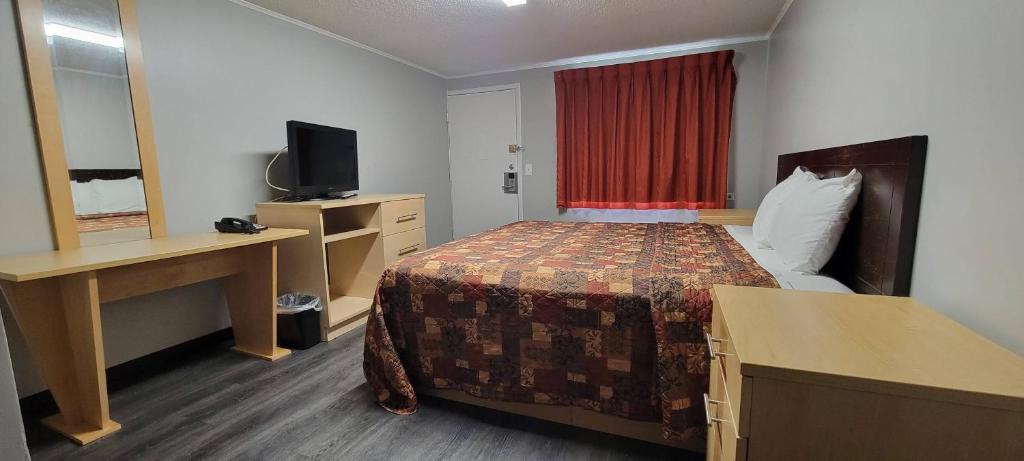 Postel nebo postele na pokoji v ubytování Superlodge