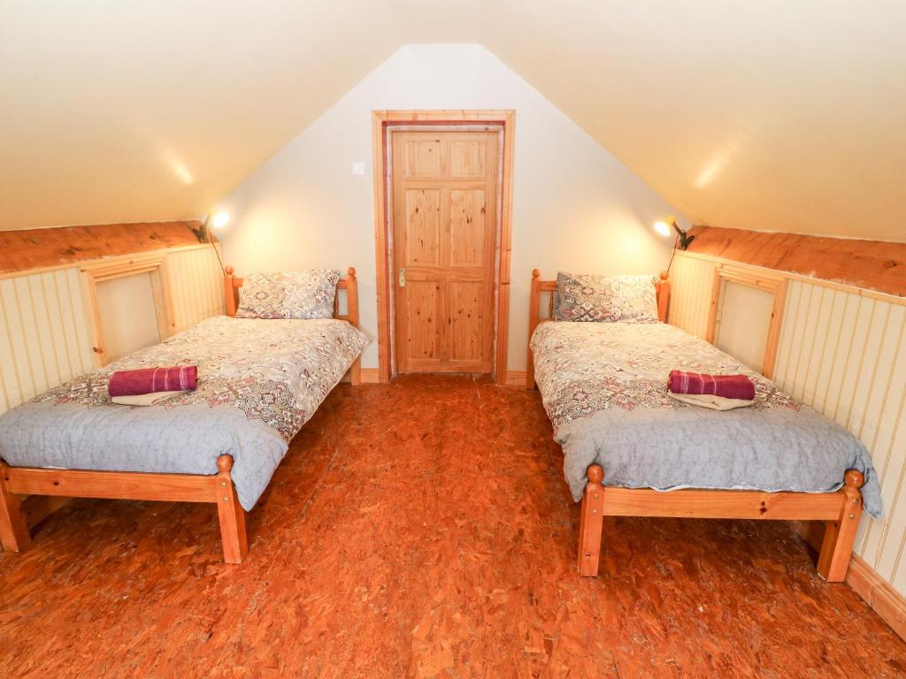 Postel nebo postele na pokoji v ubytování Teach Chiuin