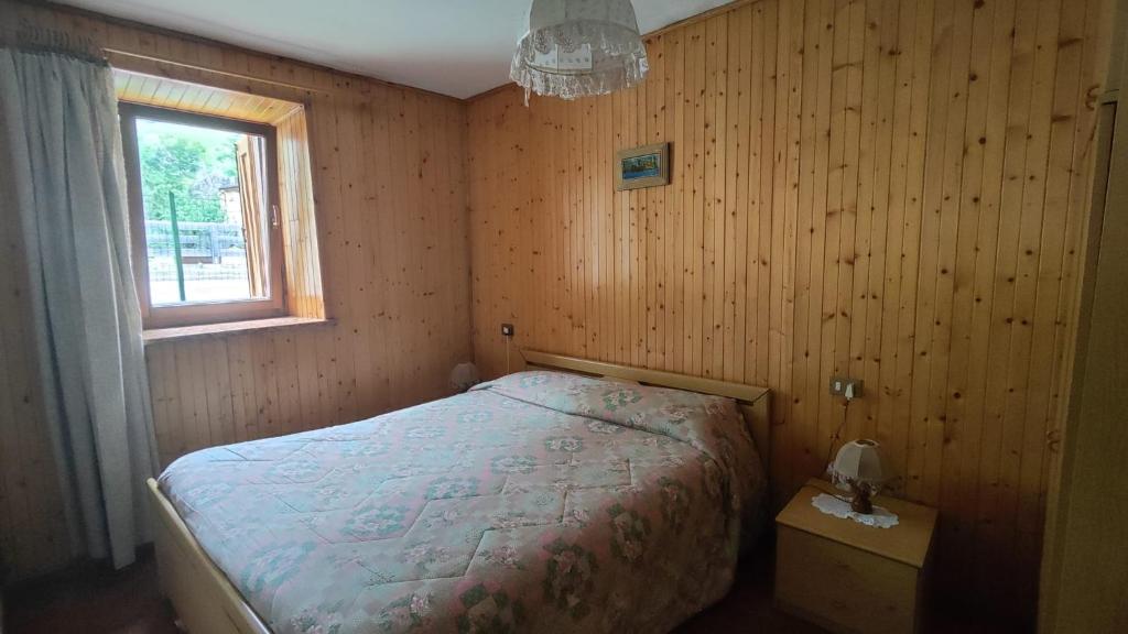 Postel nebo postele na pokoji v ubytování Residence Marmolada