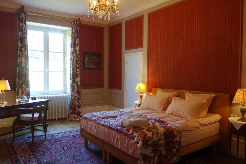 Postel nebo postele na pokoji v ubytování Château de Mauvilly