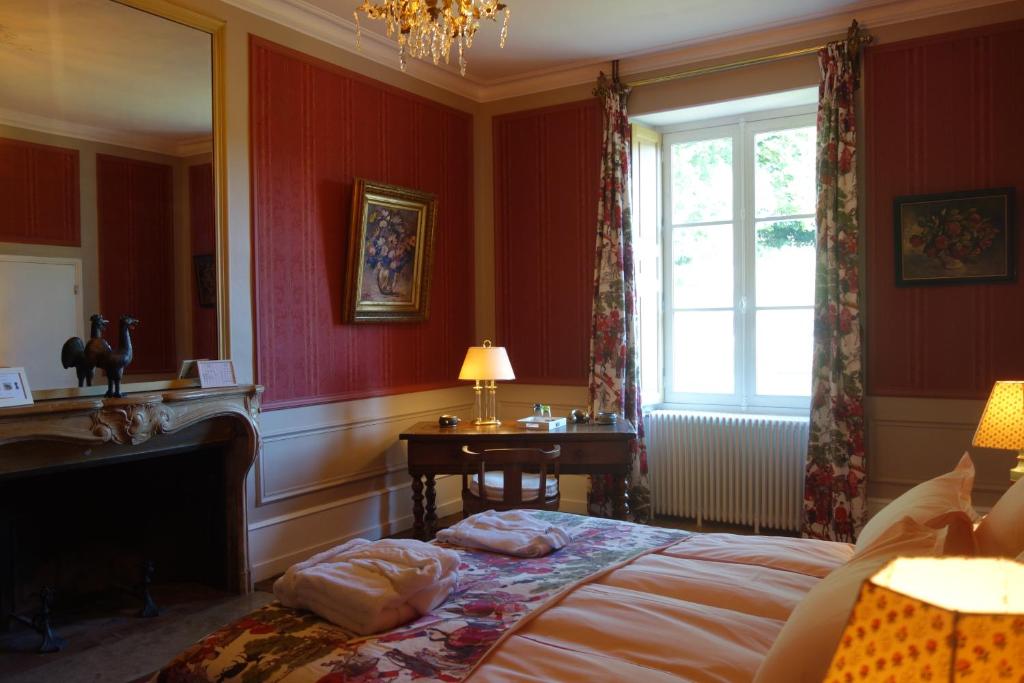 Postel nebo postele na pokoji v ubytování Château de Mauvilly