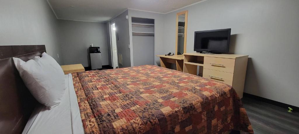 Postel nebo postele na pokoji v ubytování Superlodge