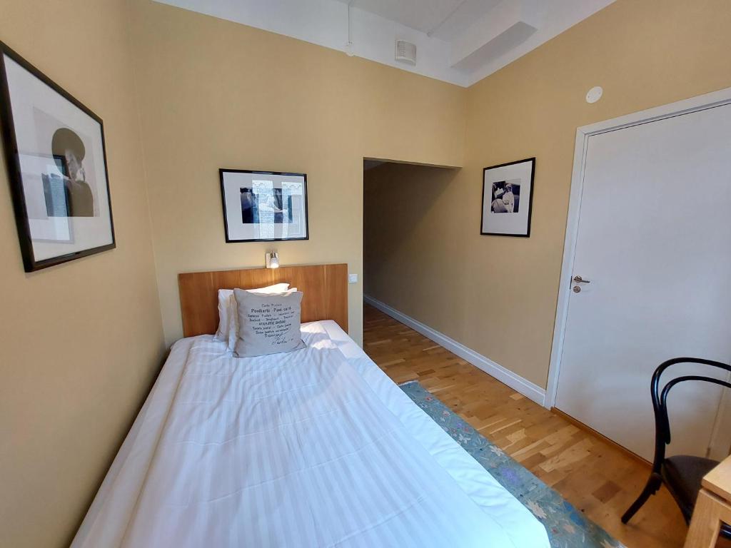 Postel nebo postele na pokoji v ubytování Hotel Bishops Arms Lund