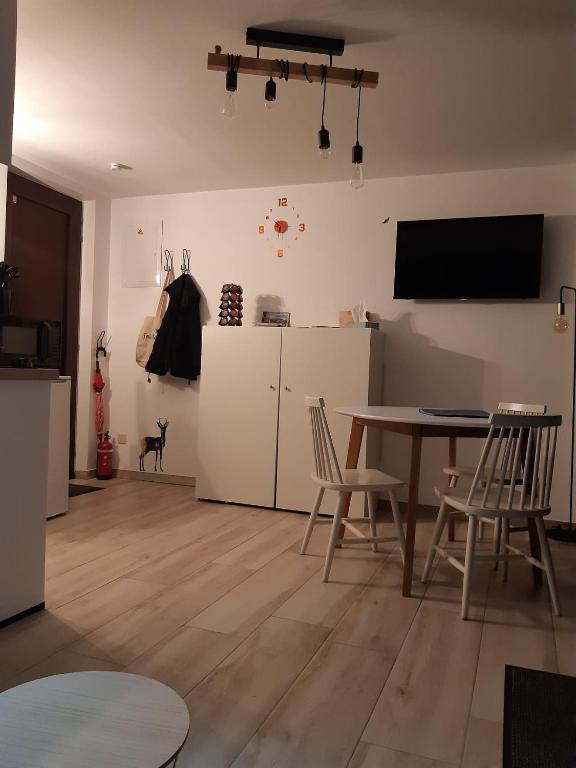 TV a/nebo společenská místnost v ubytování Le Repos'Han