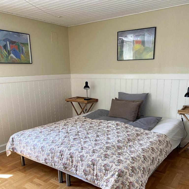 Postel nebo postele na pokoji v ubytování Holsteinshus B&B