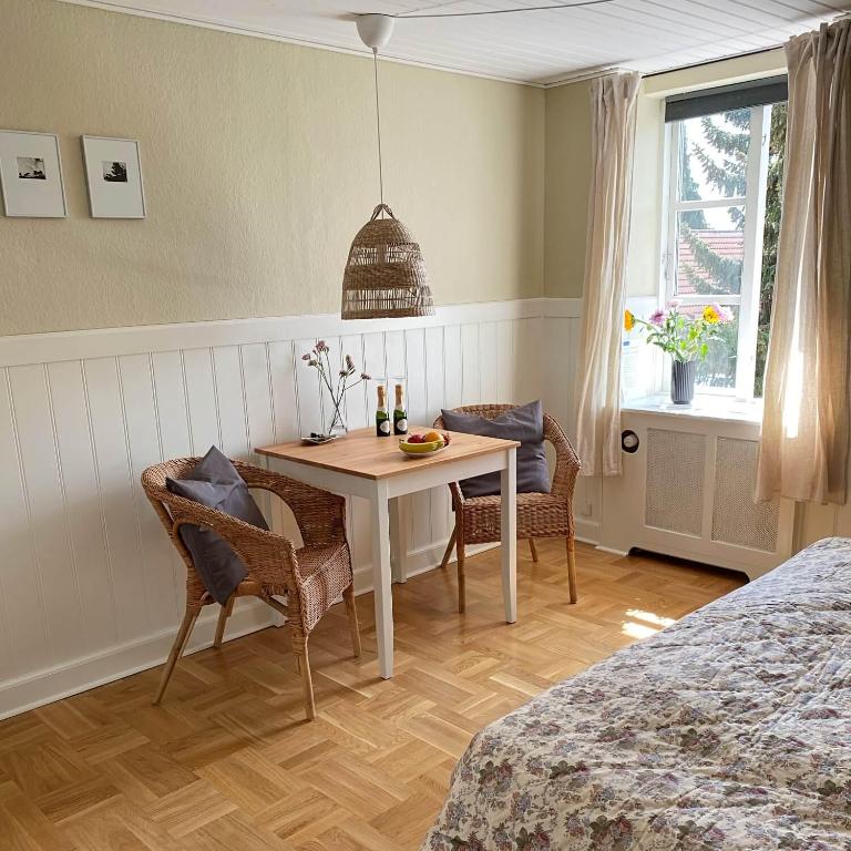 Postel nebo postele na pokoji v ubytování Holsteinshus B&B