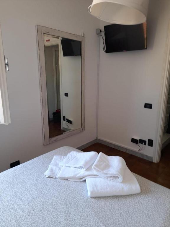 Posteľ alebo postele v izbe v ubytovaní B&B Il Viaggiatore