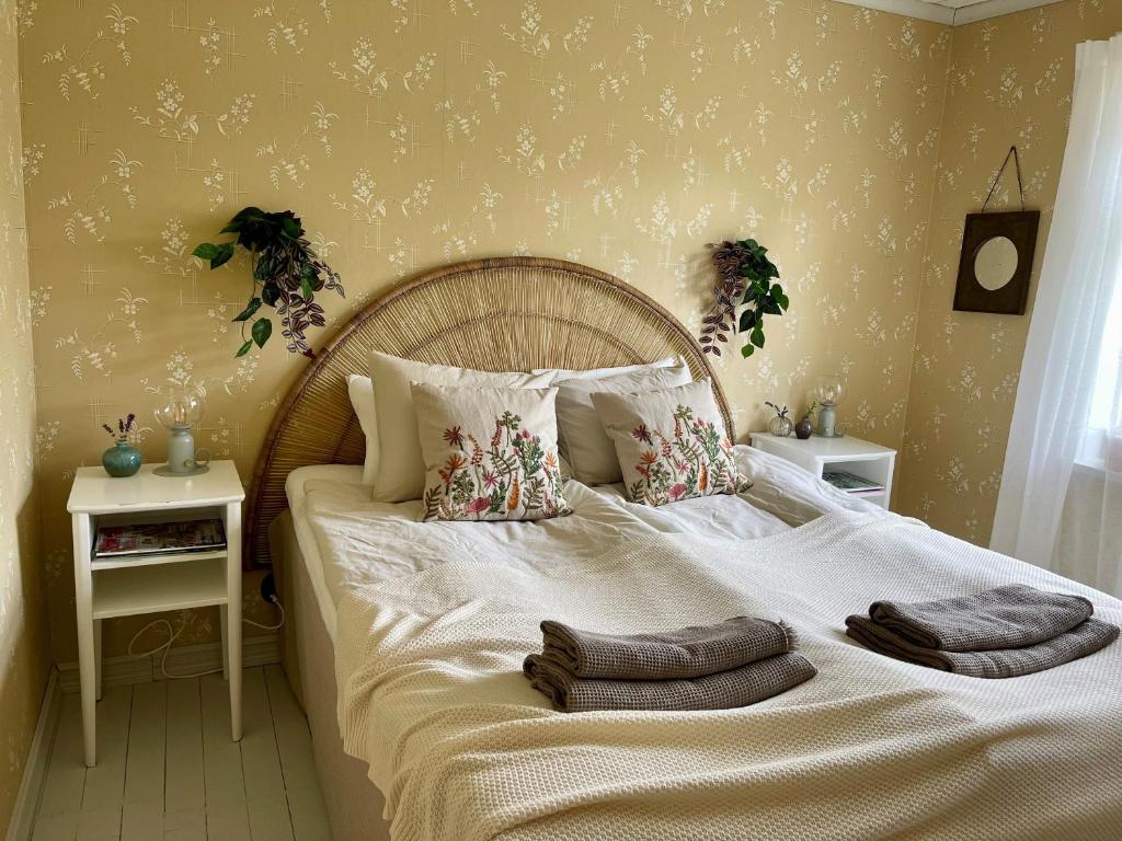 Postel nebo postele na pokoji v ubytování Gårdsfrun B&B