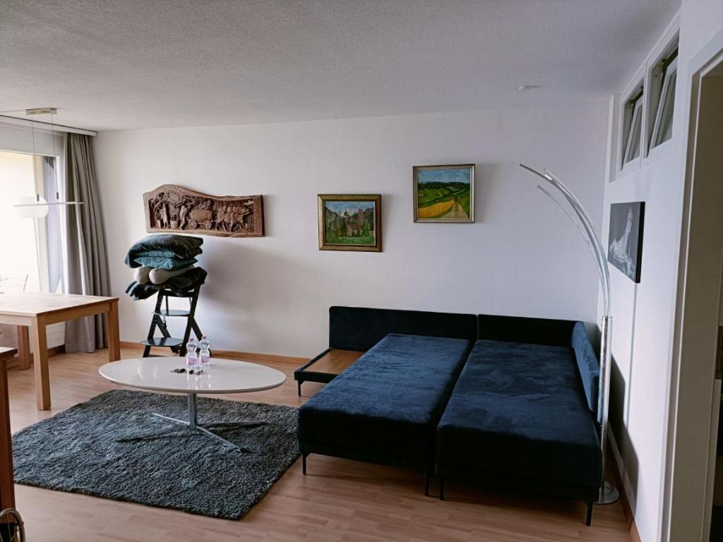 Posezení v ubytování Wohnung mit See und Bergsicht im vier Sterne Hotel